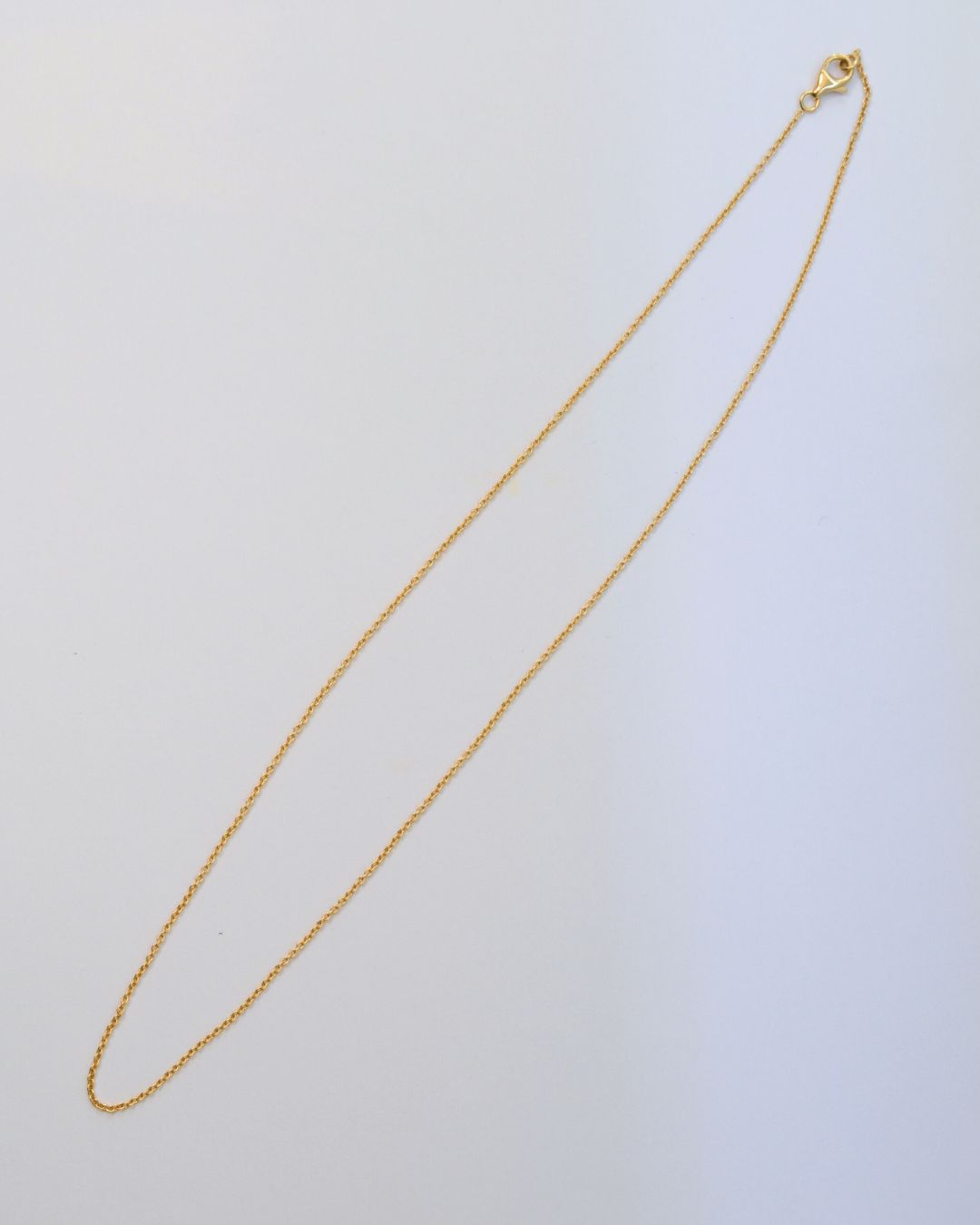 Axelle Delhaye - Fine chaîne en Or 18k.